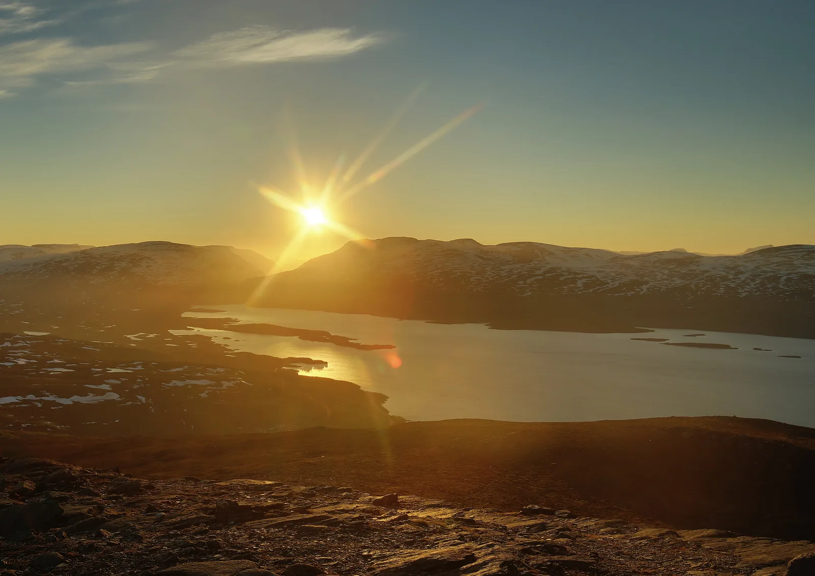 Midnight sun over Torneträsk, photographed from the summit of Nuolja on the edge of Abisko National Park