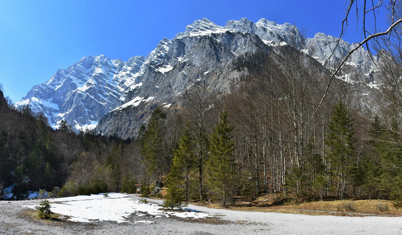 View from the Eisabach stream at Lake Königssee in Berchtesgaden National Park, up to the snow-covered Watzmann East Face