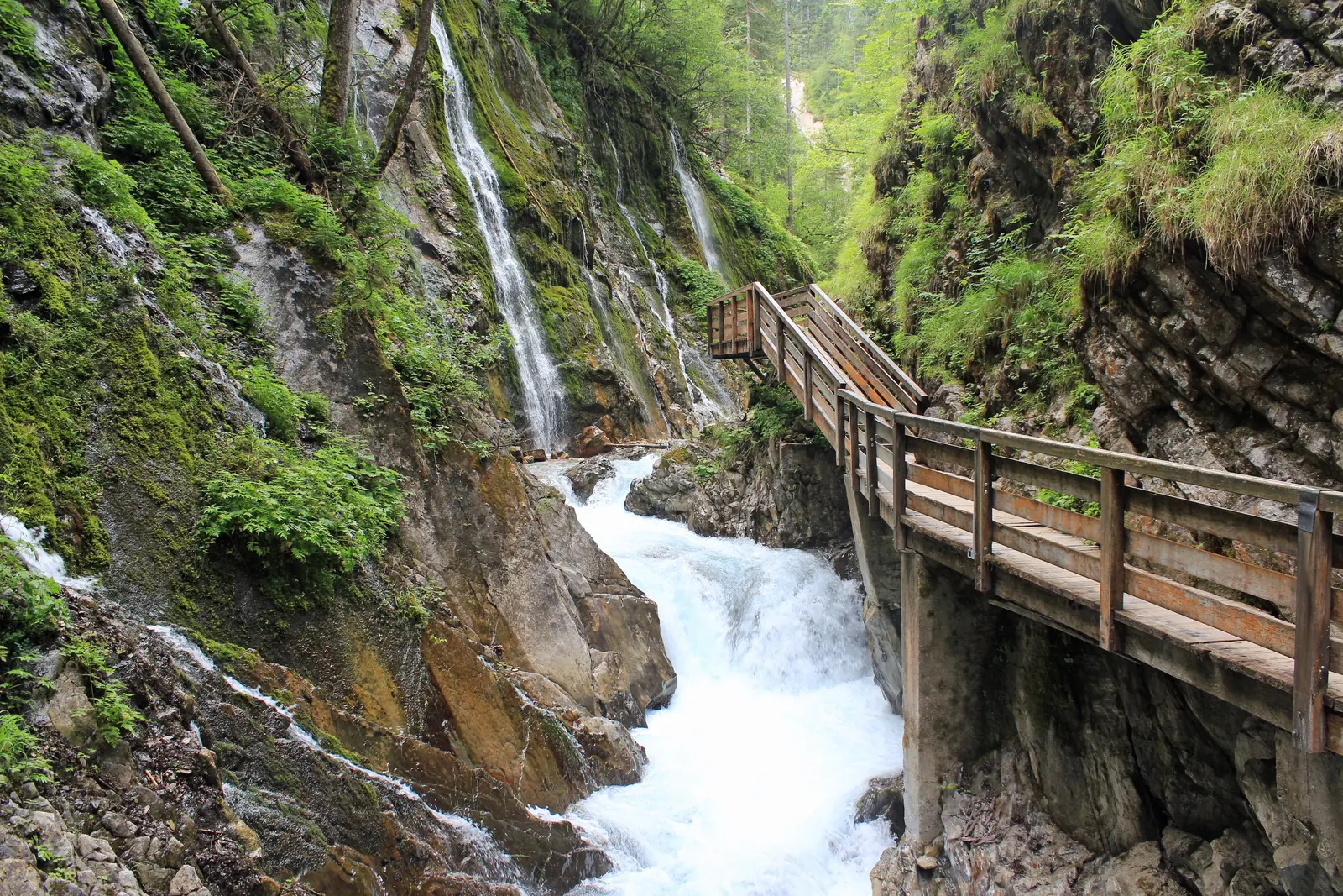 In the Wimbach Gorge in Berchtesgaden National Park: boardwalk along the rock wall