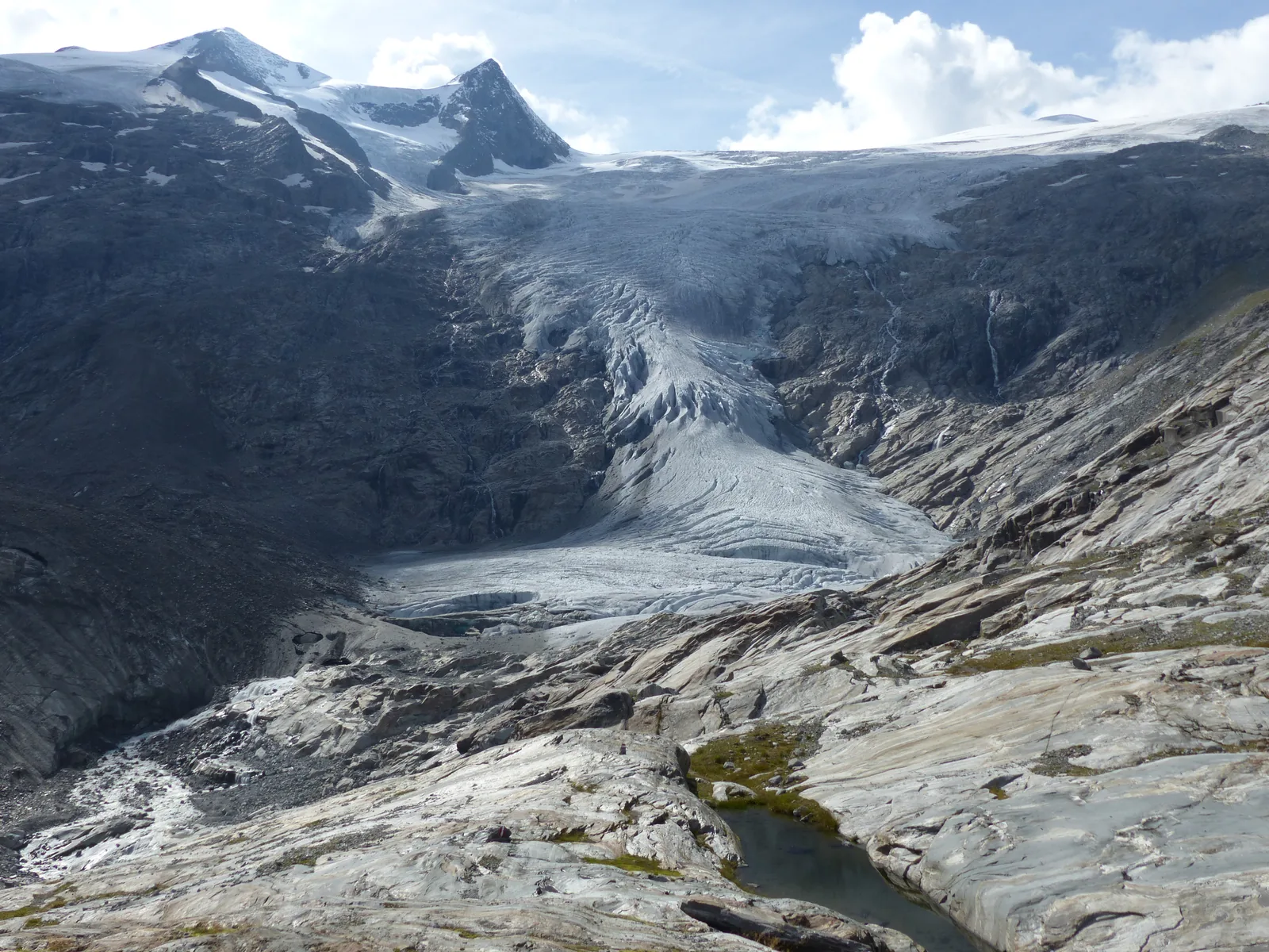 The tongue of the Schlatenkees in Hohe Tauern National Park above ice-polished rock on the Grossvenediger