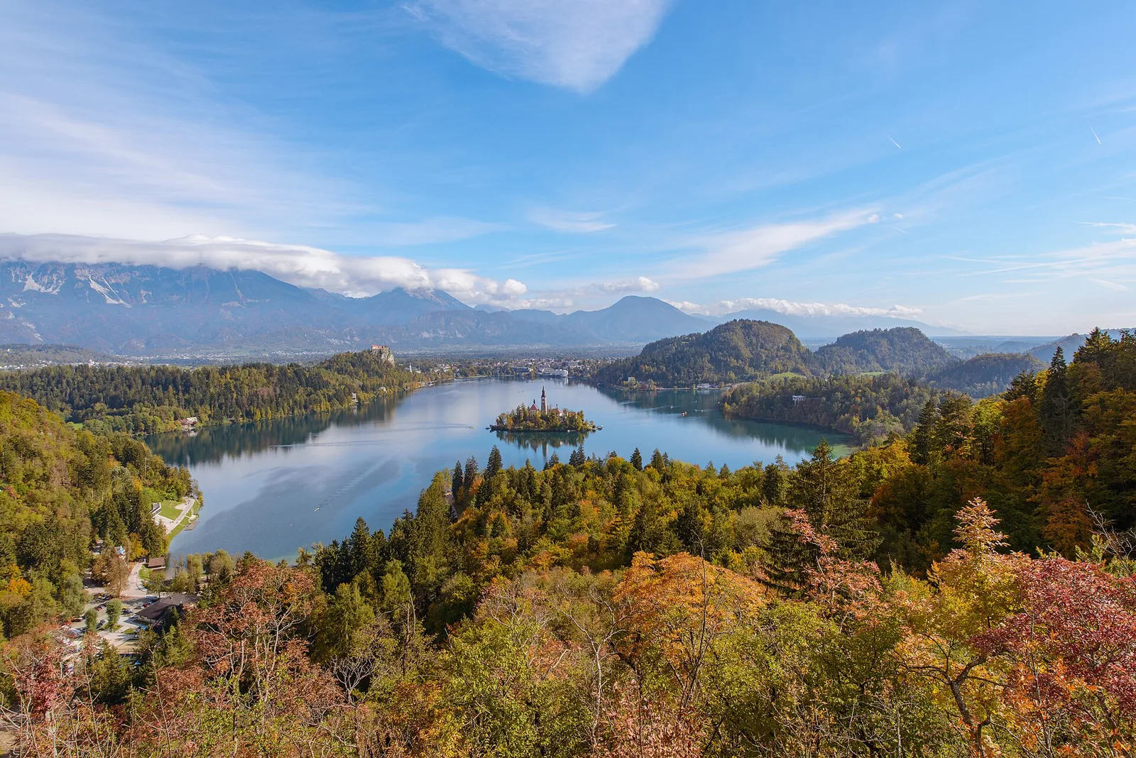 Autumn panorama over Lake Bled from Ojstrica, with Bled Island and the mountains of the Julian Alps behind