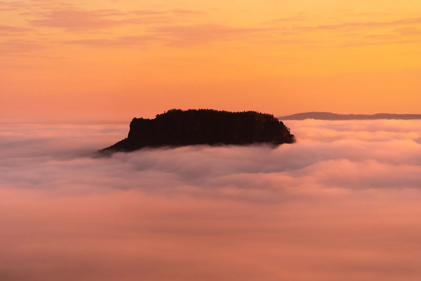 View from the Gohrisch in Saxon Switzerland National Park to the Lilienstein at sunrise
