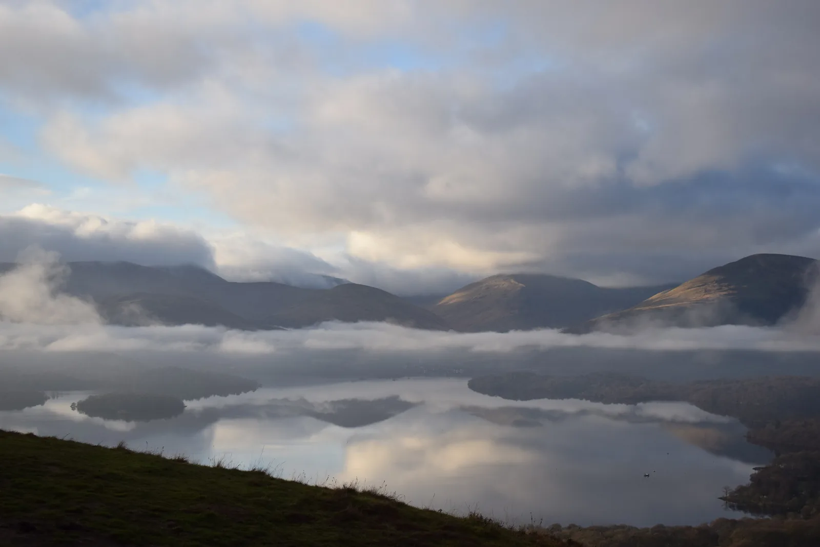 Cloud and mist over Loch Lomond, from the path up Conic Hill in Loch Lomond & The Trossachs National Park