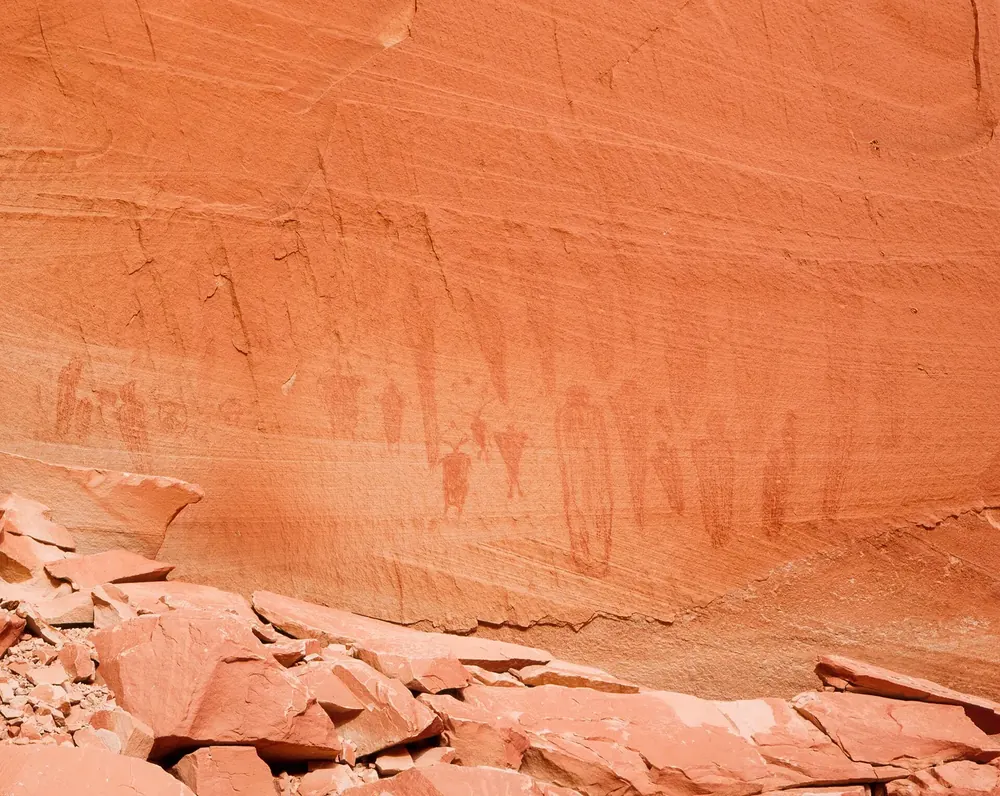 Rock art in Horseshoe Canyon, Canyonlands National Park, the destination of the trail from the trailhead: figures on a red sandstone wall