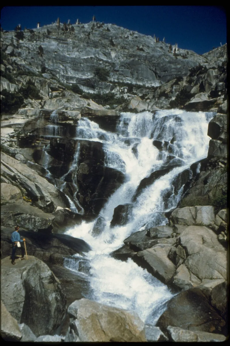 Tokopah Falls in Sequoia National Park: cascades tumble over smooth granite steps below a pale, steep rock face