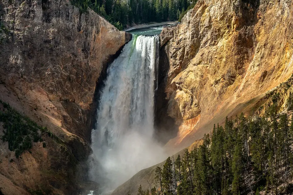 Lower Falls in Yellowstone National Park: the Yellowstone River plunges into the yellow-orange Grand Canyon of the Yellowstone.
