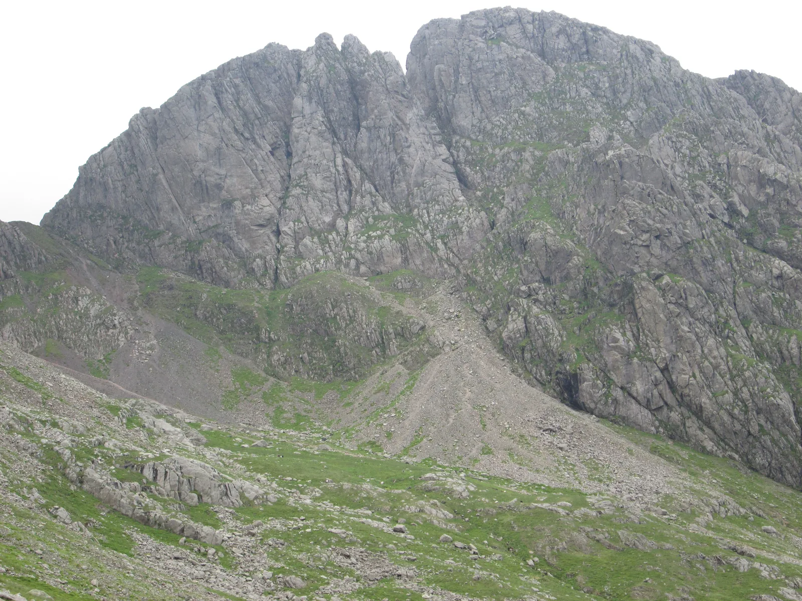 The crags of Scafell above the Hollow Stones corrie on the route from Wasdale Head to Scafell Pike in the Lake District National Park