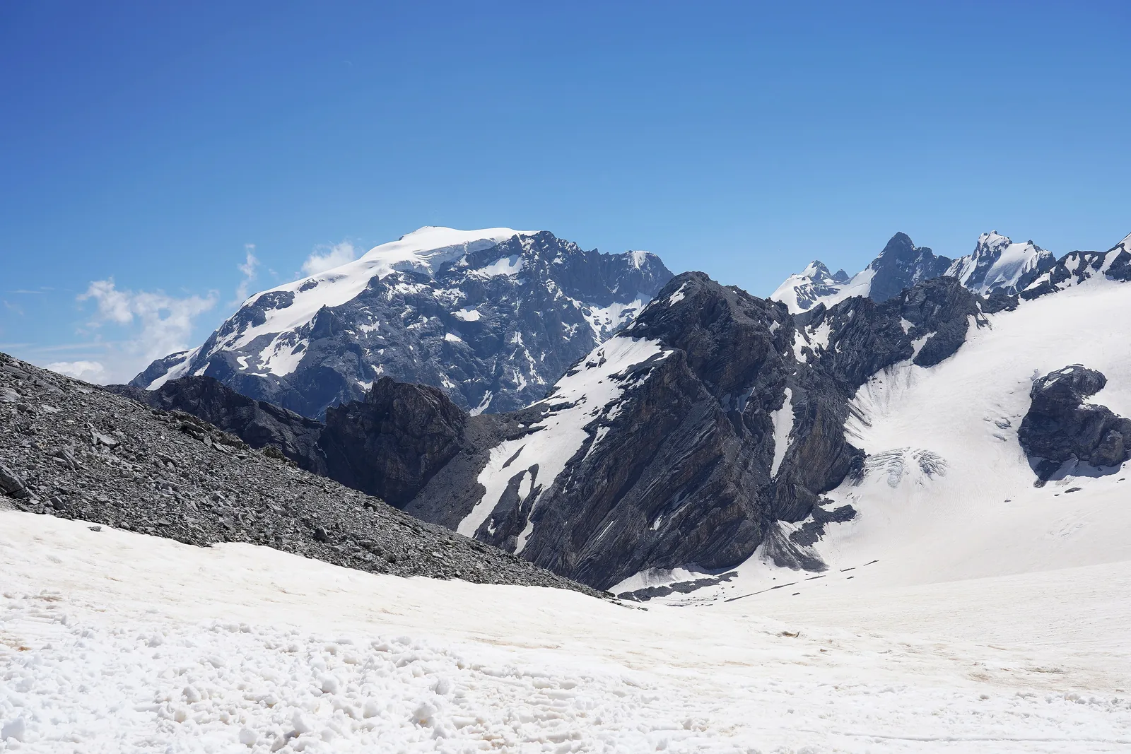 The Ortler in Stelvio National Park above snowfields, seen from Monte Livrio above the pass