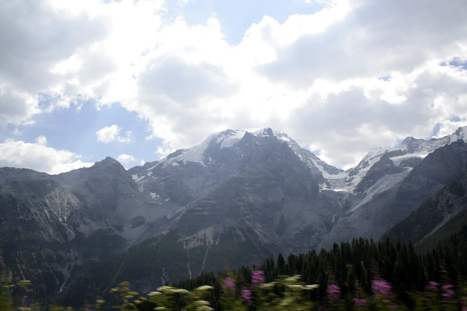The Ortler with glaciers above the valley, seen from the Stelvio Pass road in Stelvio National Park
