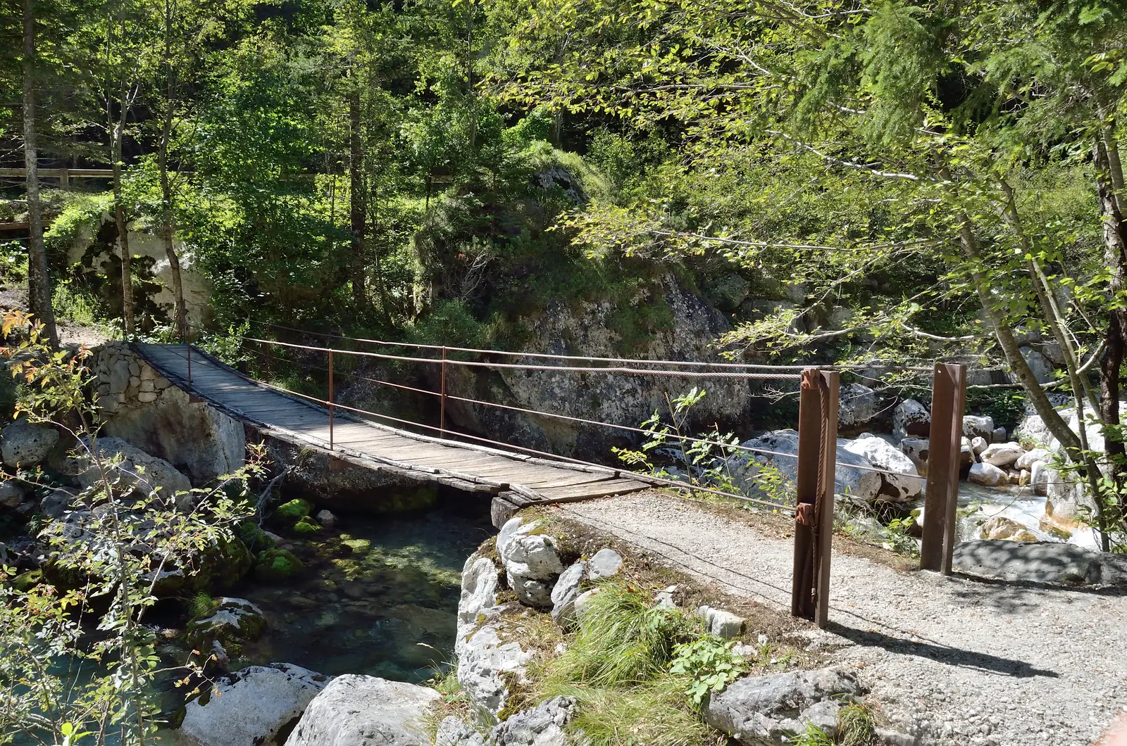 Suspension bridge over the Soča at the mouth of the Mlinarica gorge in Triglav National Park