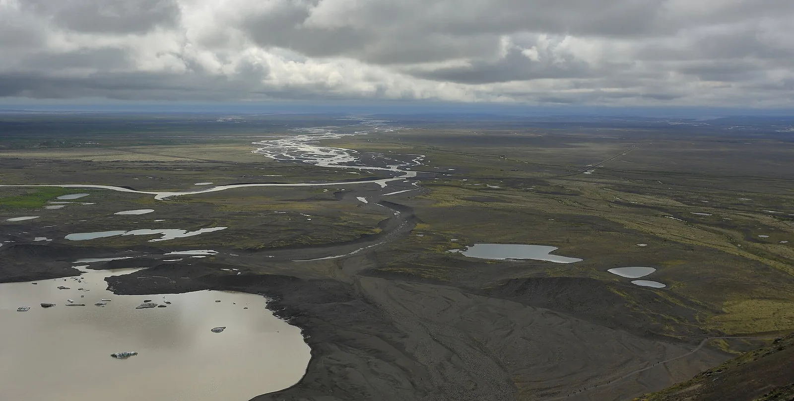 View from Skaftafellsheiði in Vatnajökull National Park over Skeiðarársandur with braided river channels to the horizon