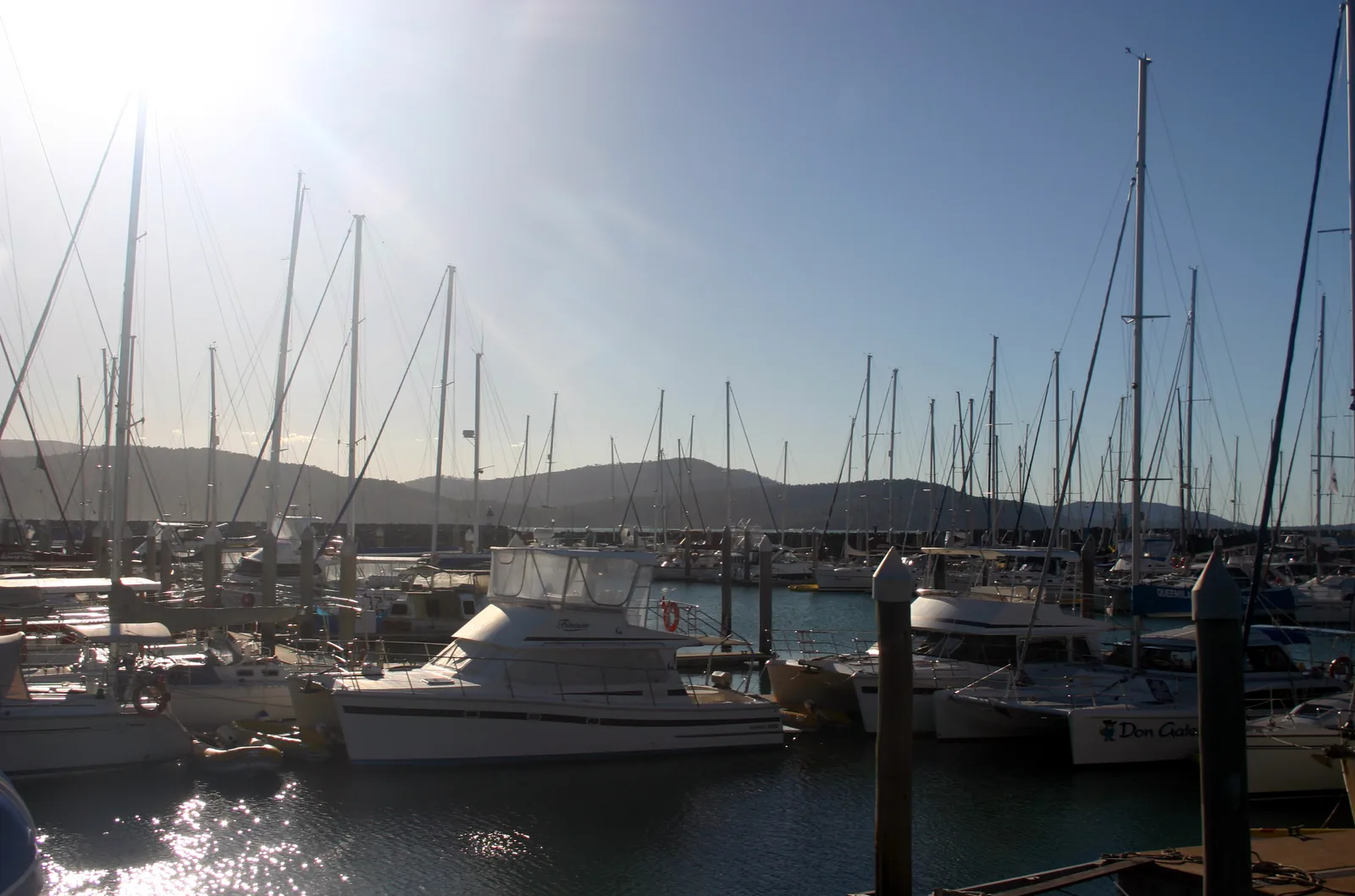 Sailing boats and motor yachts in Abel Point Marina in Airlie Beach, the departure point for the Whitsundays