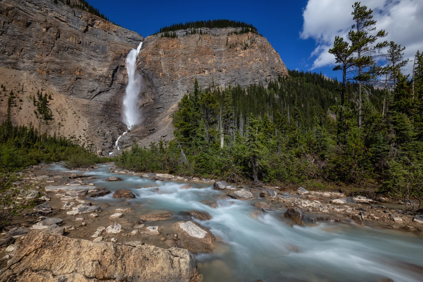 Takakkaw Falls in Yoho National Park plunging over a high rock wall into the Yoho Valley